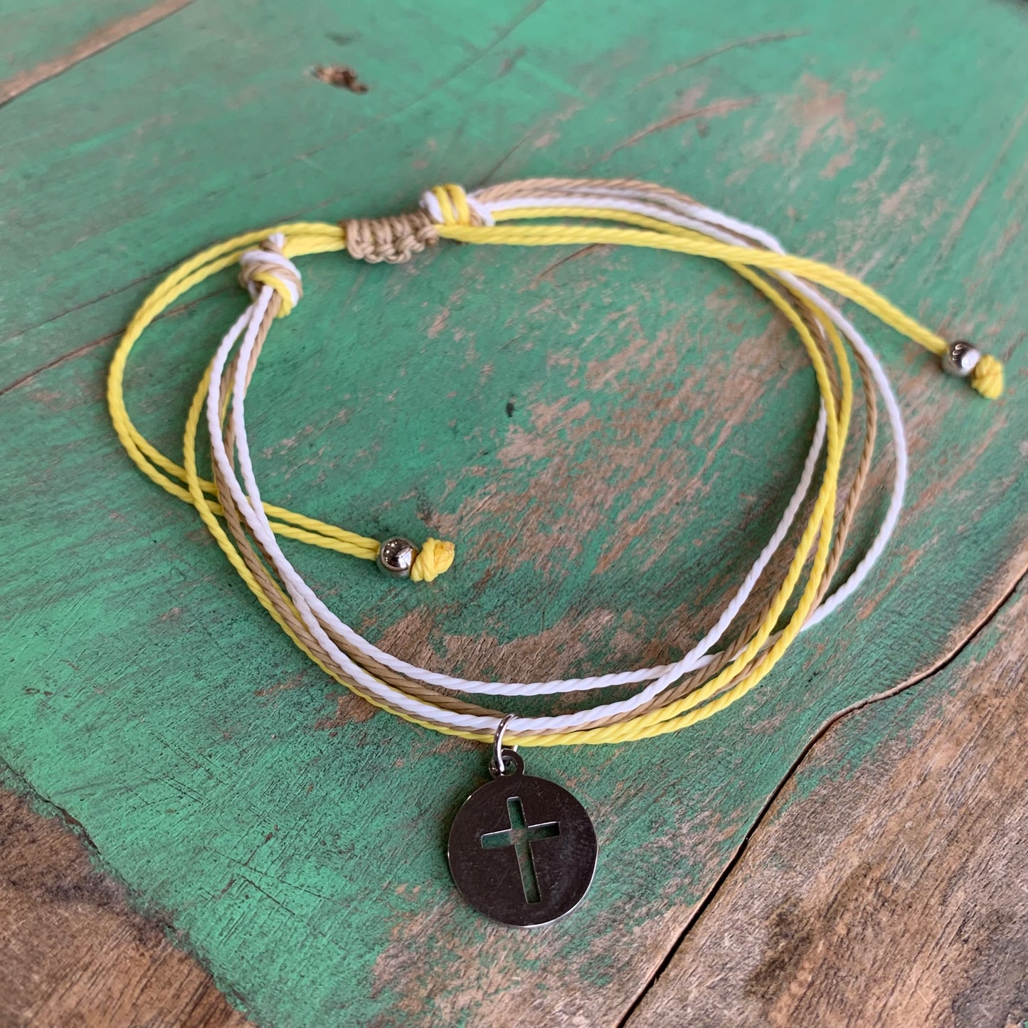 Six Cord Cross Bracelet