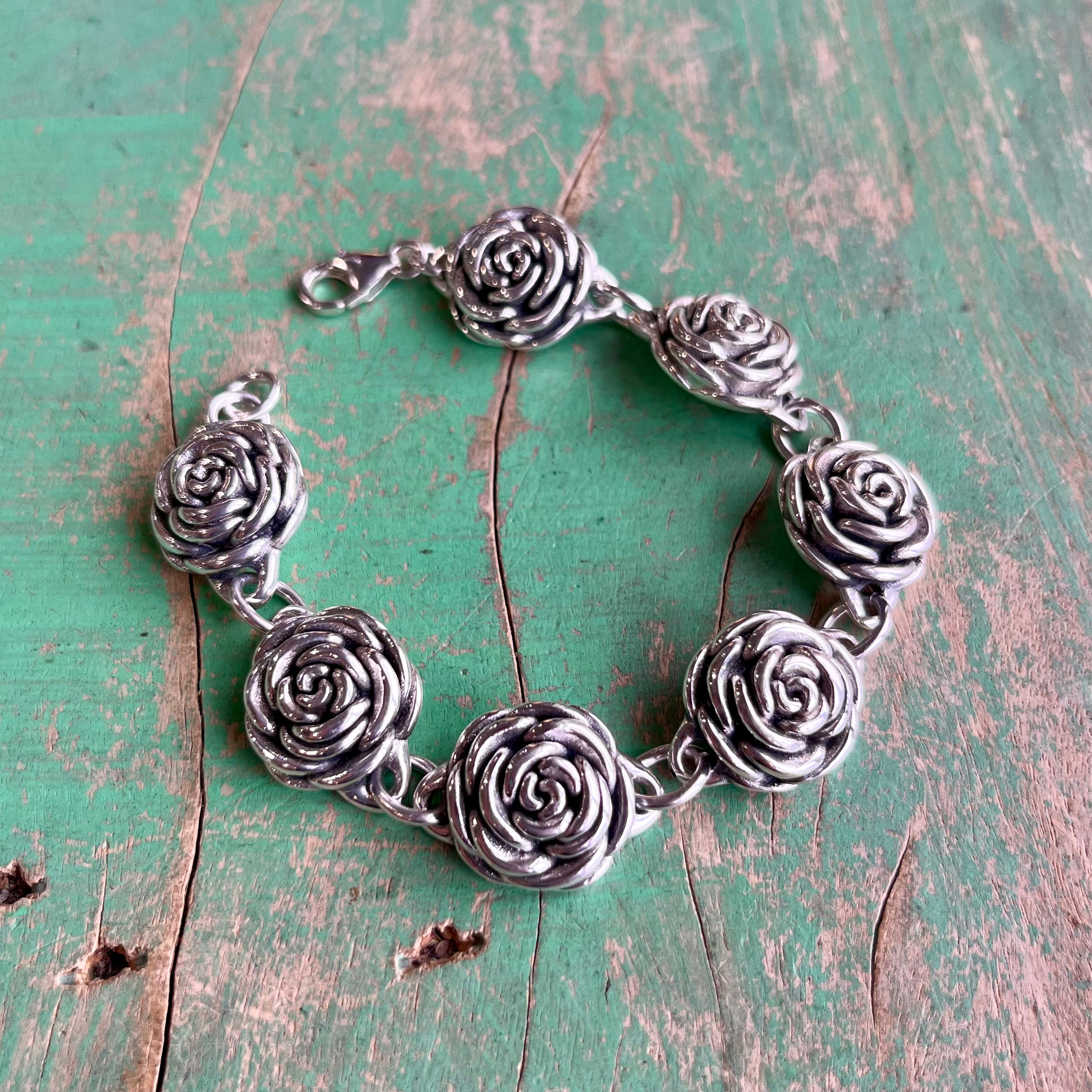 Sterling Silver Seven Rose Bud Bracelet or Earrings