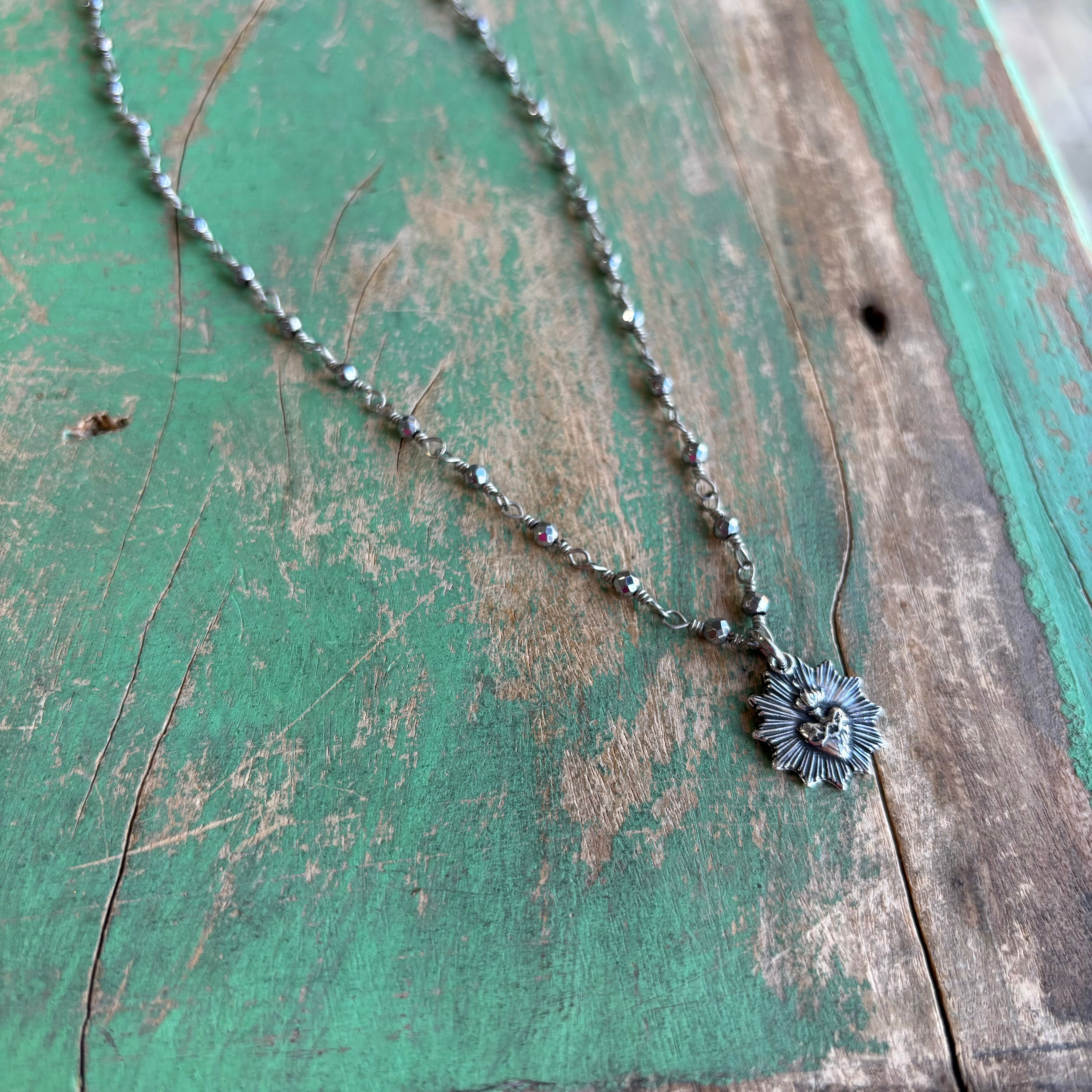 Sacred Heart Burst Hematite Necklace