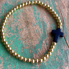Howlite Cross with Gold Beaded Bracelet
