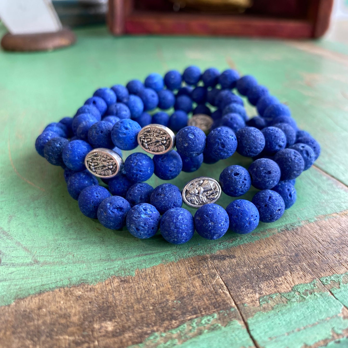 St Michael Blue Lava Bead Bracelet