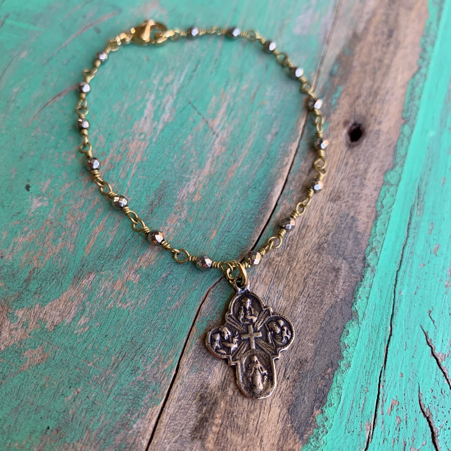 Two Toned 4 Way Cross Bracelet and Earrings