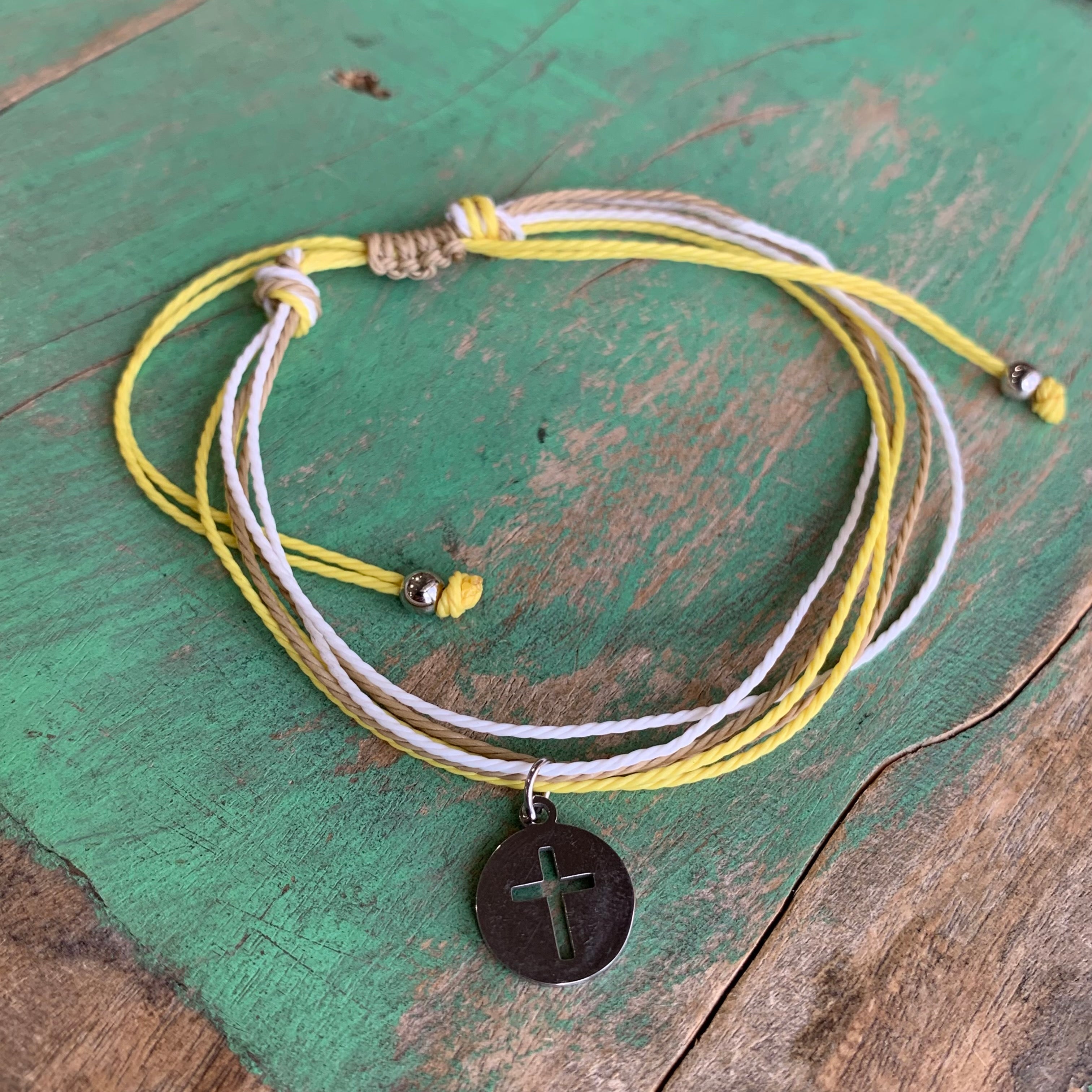 Six Cord Cross Bracelet